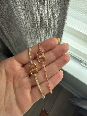 Tory Burch Gold Logo Charm Bracelets in Cream and Peach